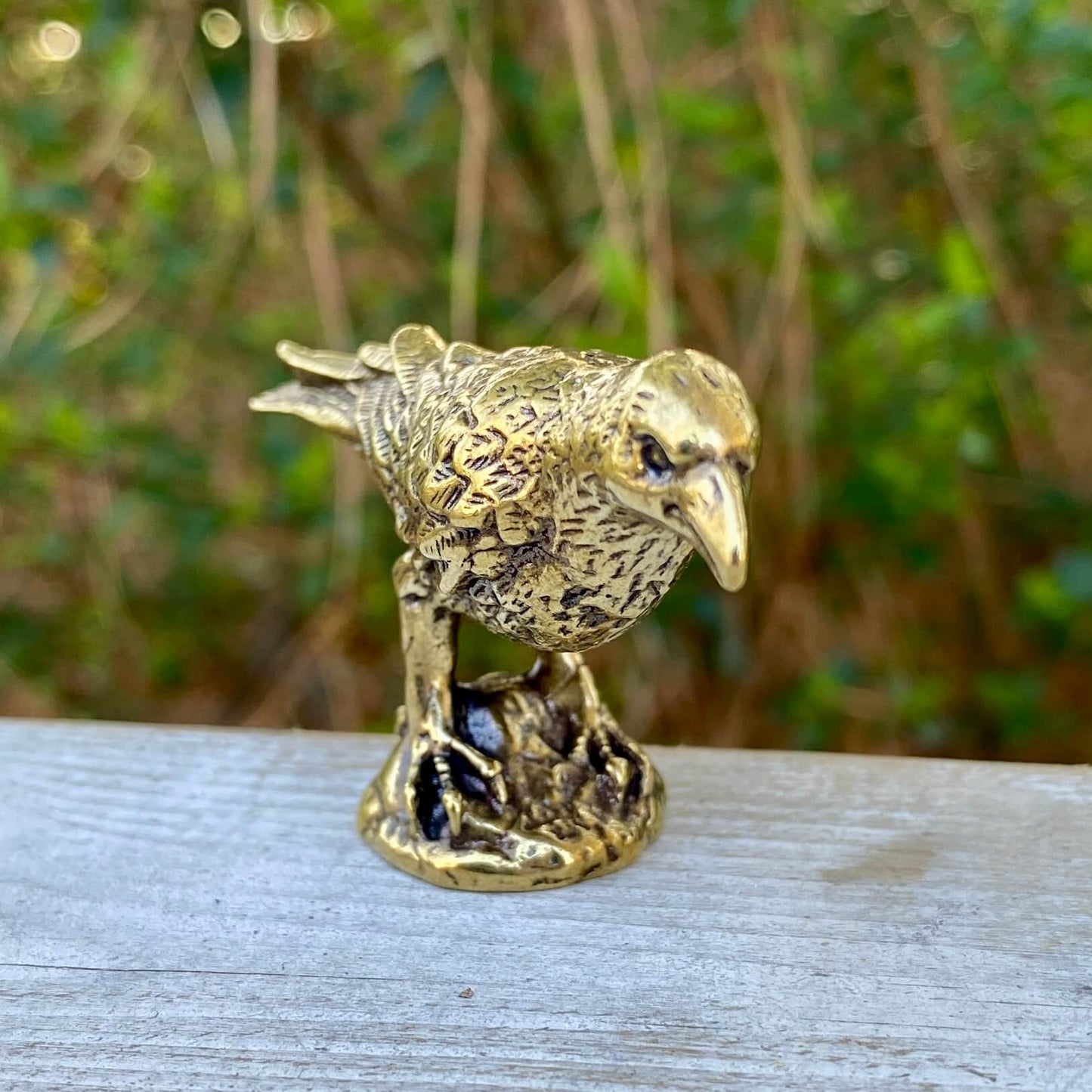 Solid brass raven sculpture by Wild Brass, symbol of intelligence, wisdom, and prophecy, detailed and crafted with intricate design.