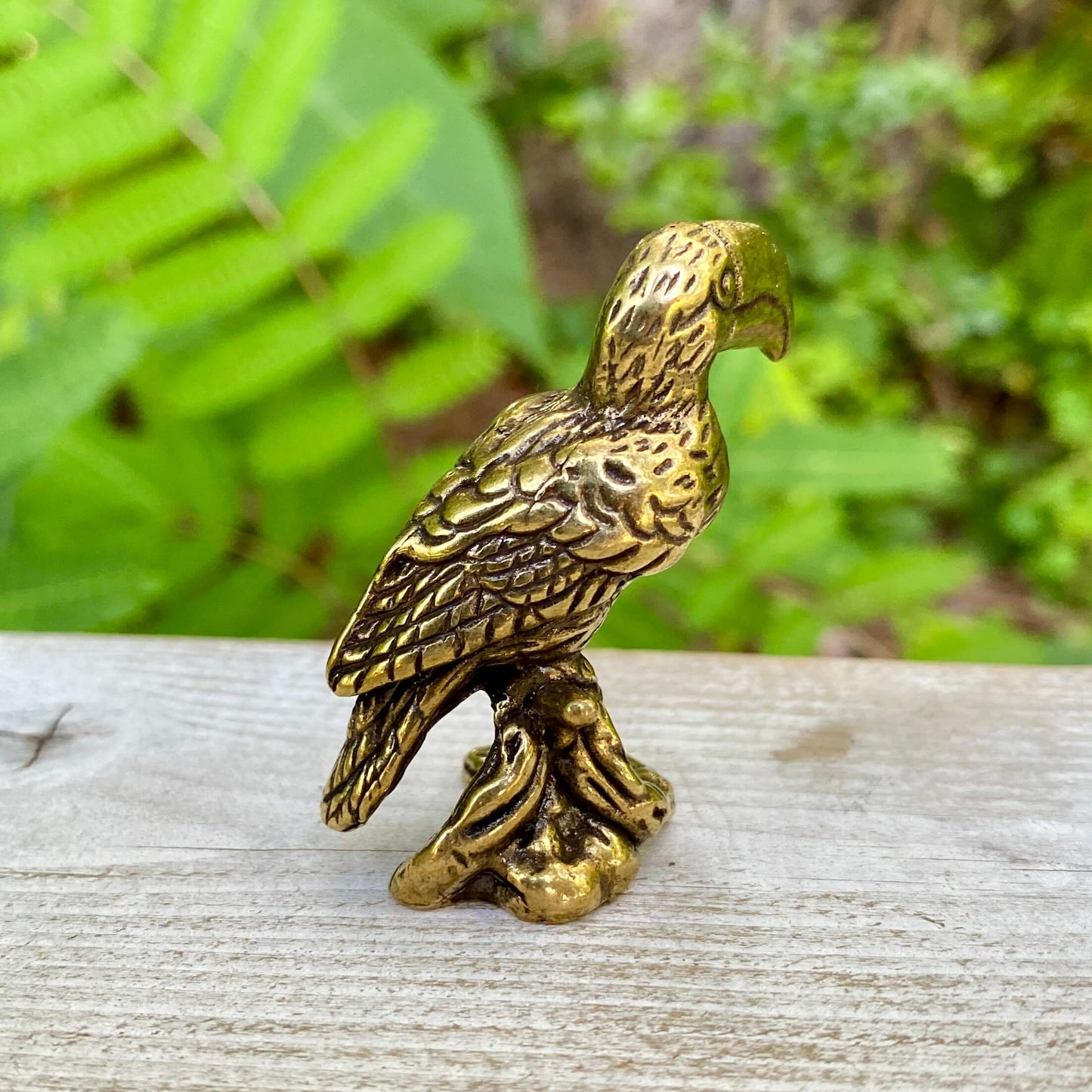 Solid brass toucan bird sculpture by Wild Brass, showcasing vibrant colors and playful design, symbolizing communication and vibrancy.