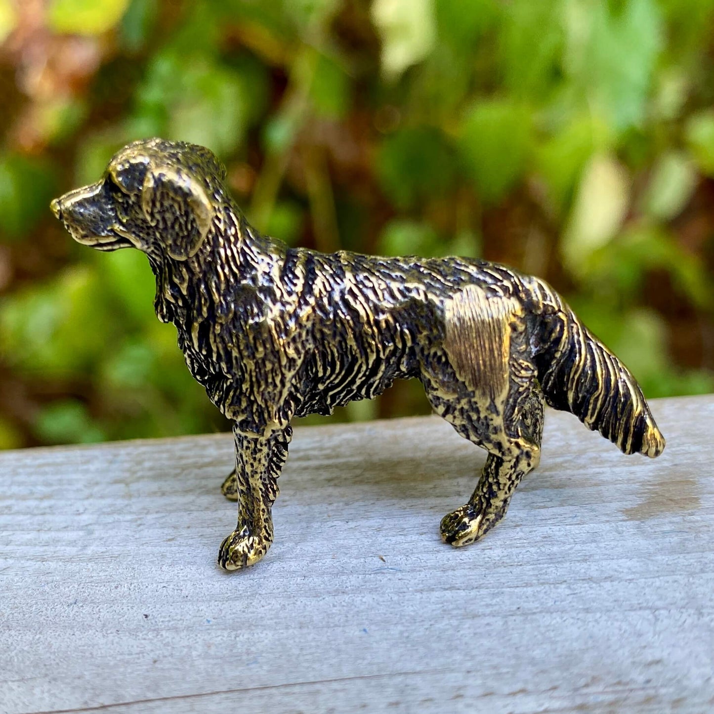 Solid brass Labrador Retriever figurine by Wild Brass, symbolizing loyalty, friendliness, and service, with detailed craftsmanship.