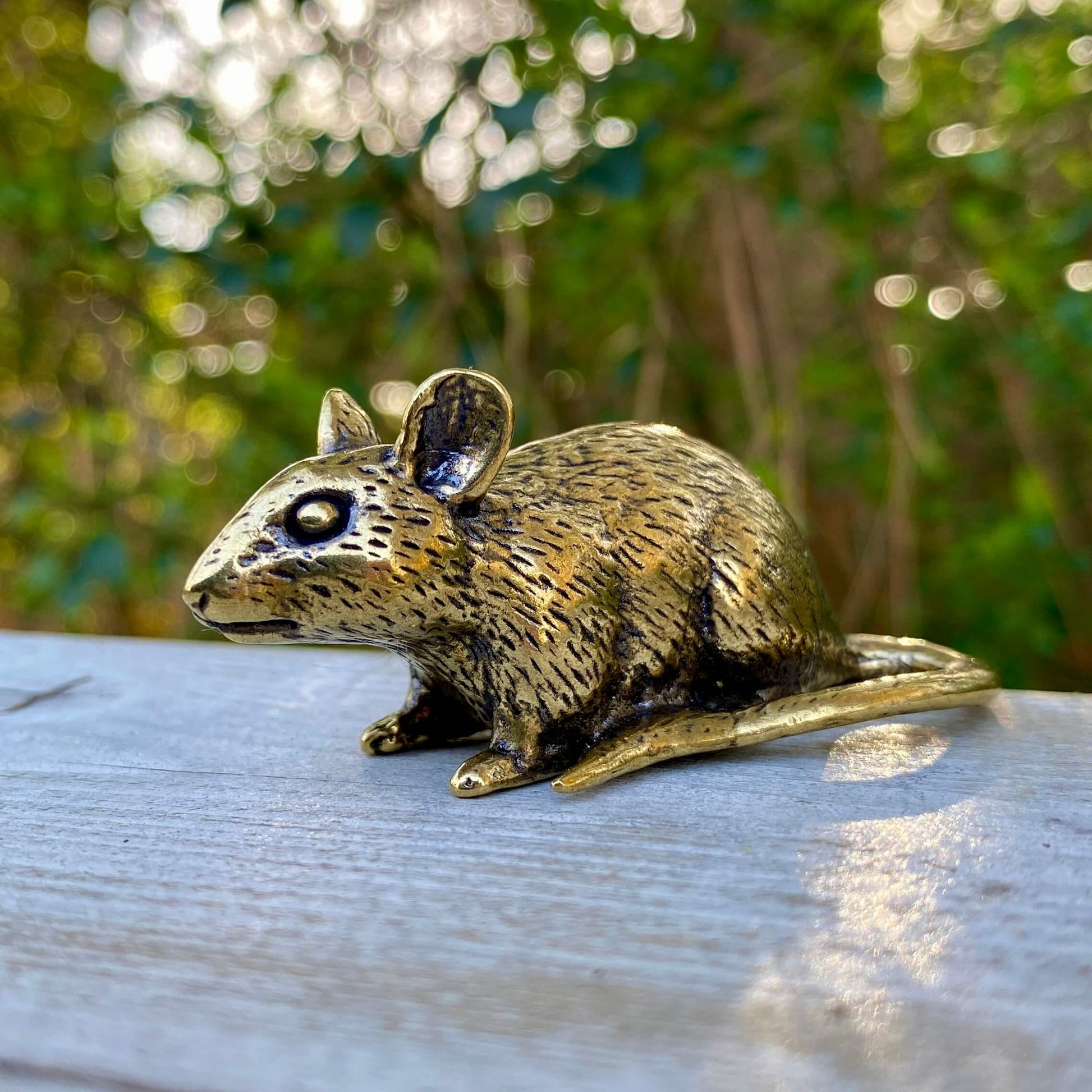 Solid brass rat sculpture by Wild Brass, symbol of intelligence and resourcefulness, detailed and polished mouse or rat figurine.