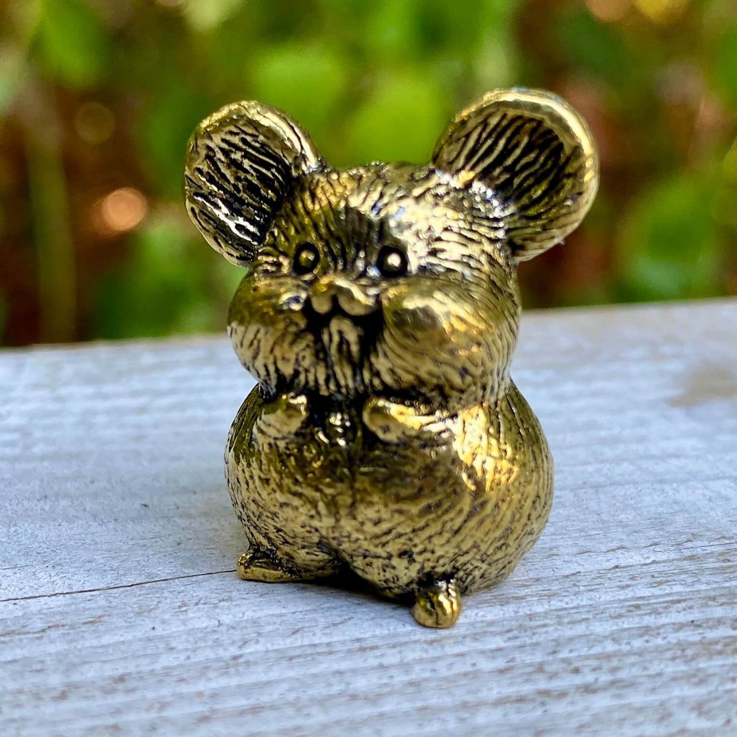 Solid brass mouse figurine by Wild Brass, symbolizing curiosity, adaptability, and awareness, with detailed craftsmanship and a smooth finish.