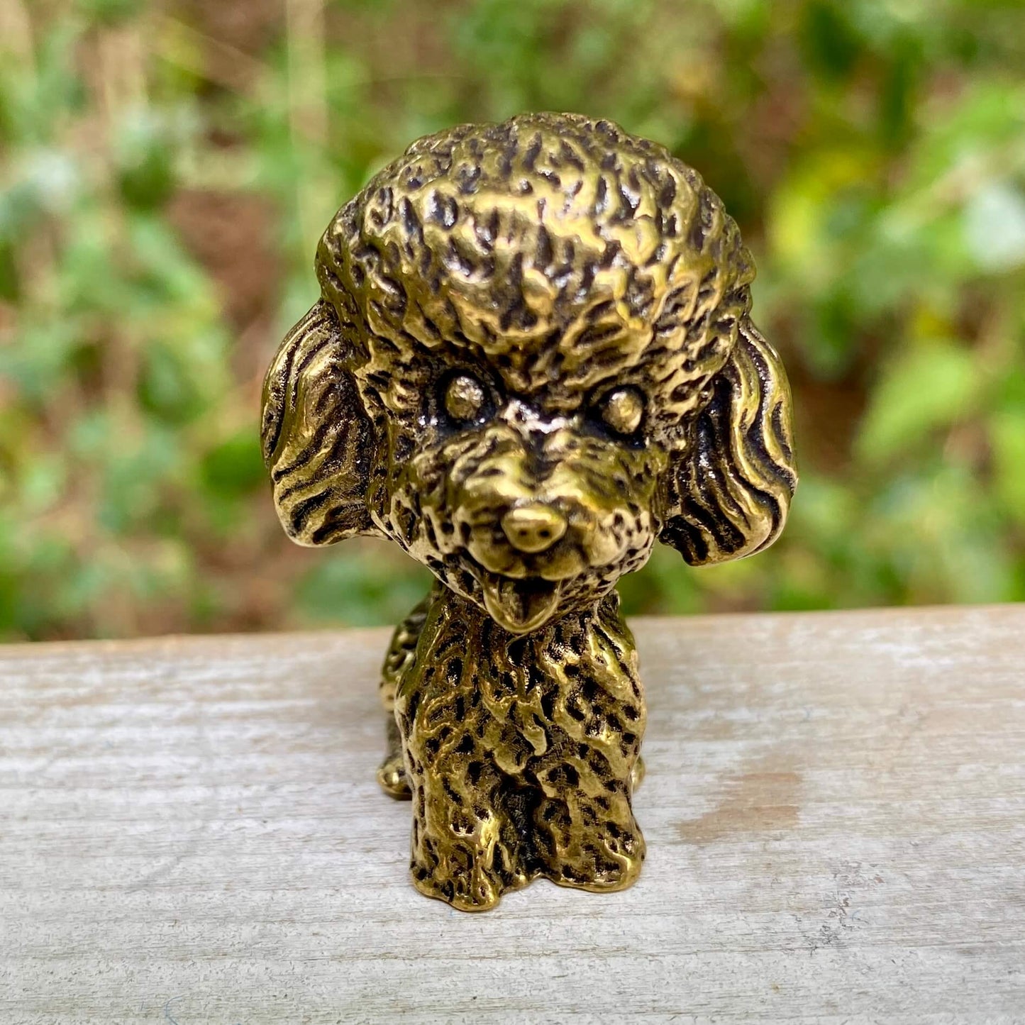 Solid brass poodle sculpture by Wild Brass, showcasing an elegant, detailed poodle figure symbolizing intelligence and loyalty.