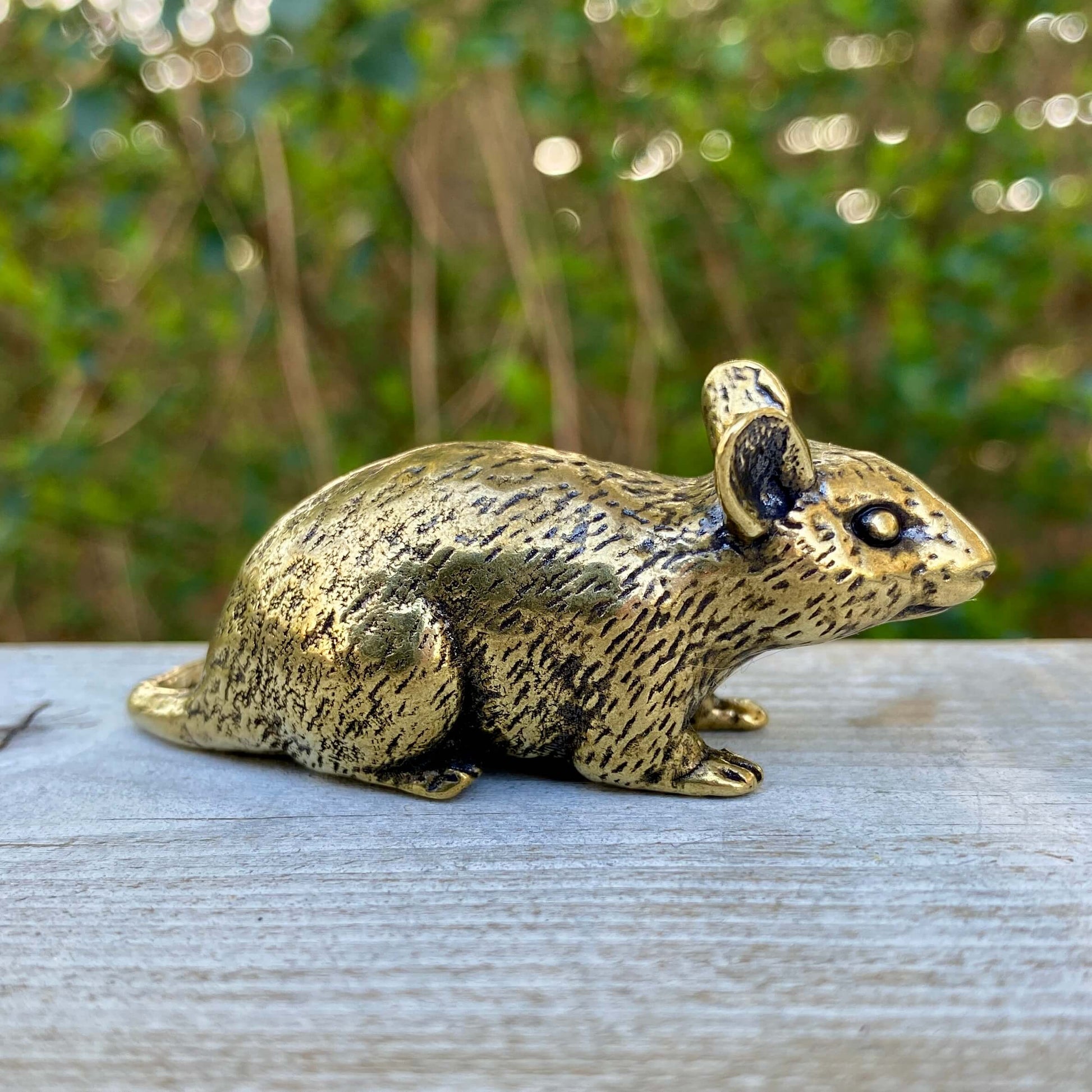 Solid brass rat sculpture by Wild Brass, symbolizing intelligence and resourcefulness, with detailed craftsmanship and polished finish.