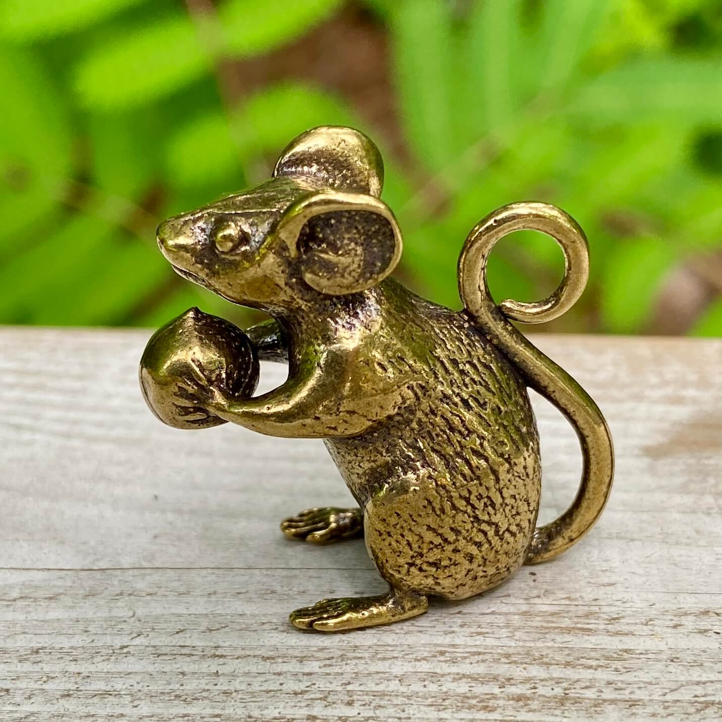 Solid brass mouse figurine by Wild Brass, symbol of curiosity, adaptability, and awareness, detailed view of the crafted sculpture.