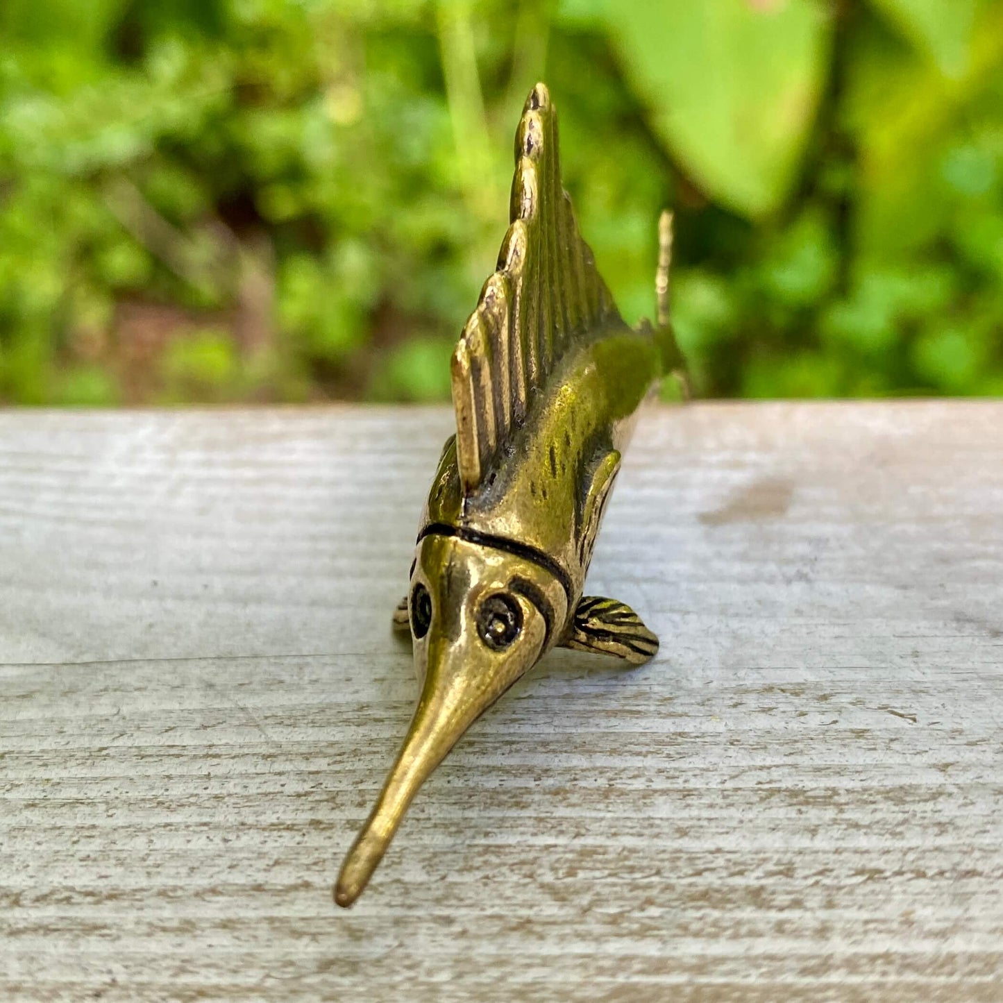 Solid brass Marlin fish sculpture by Wild Brass, featuring a sleek marlin design symbolizing speed, precision, and nobility.