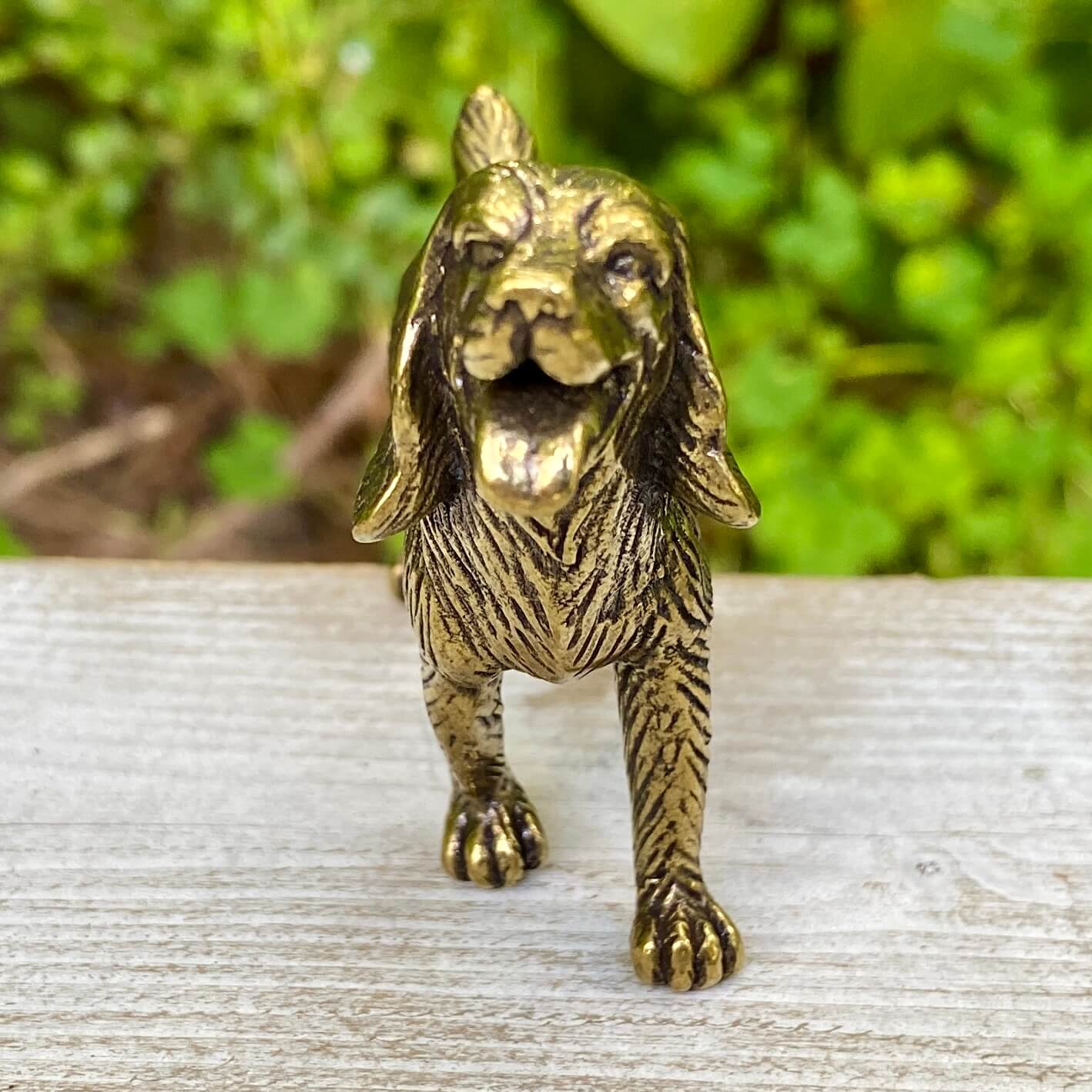 Solid brass cocker spaniel figurine by Wild Brass, detailed sculpture symbolizing gentleness, devotion, and affection.