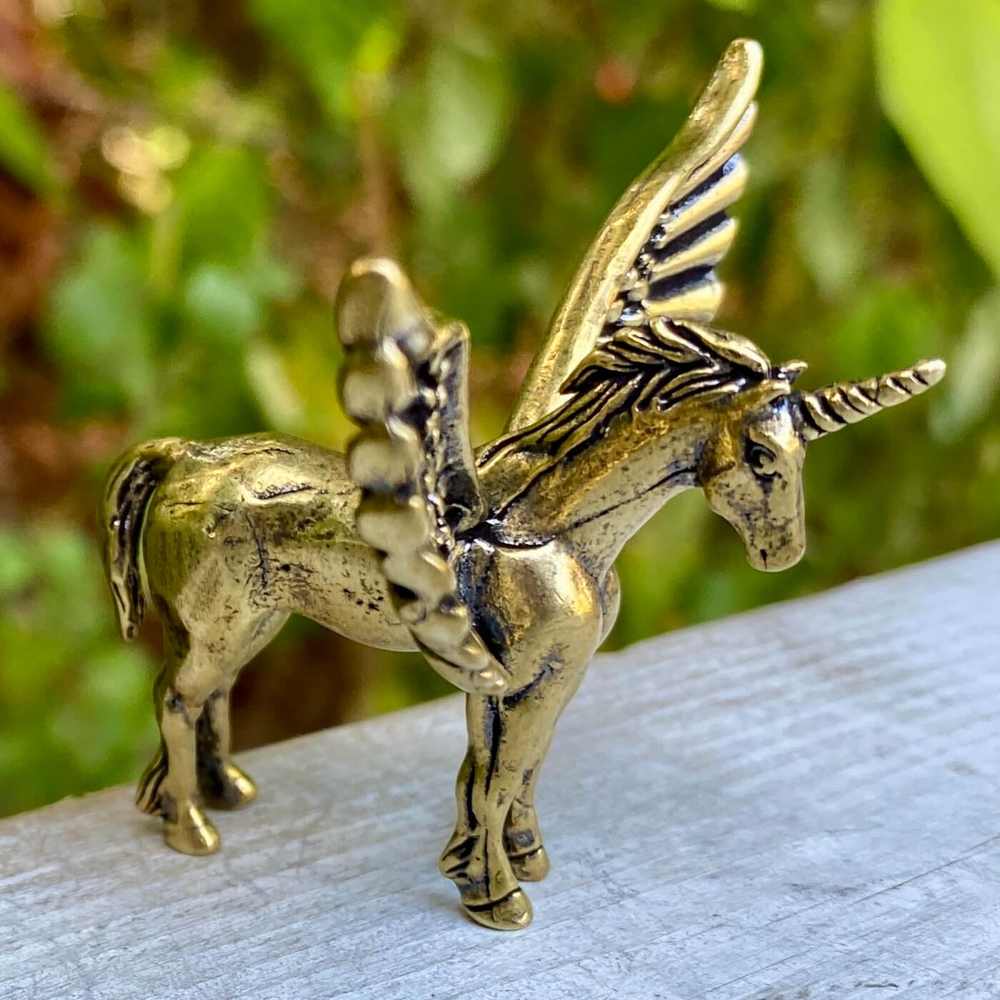 Solid brass Pegasus sculpture by Wild Brass, symbol of freedom, inspiration, and divine power, detailed horse with wings.