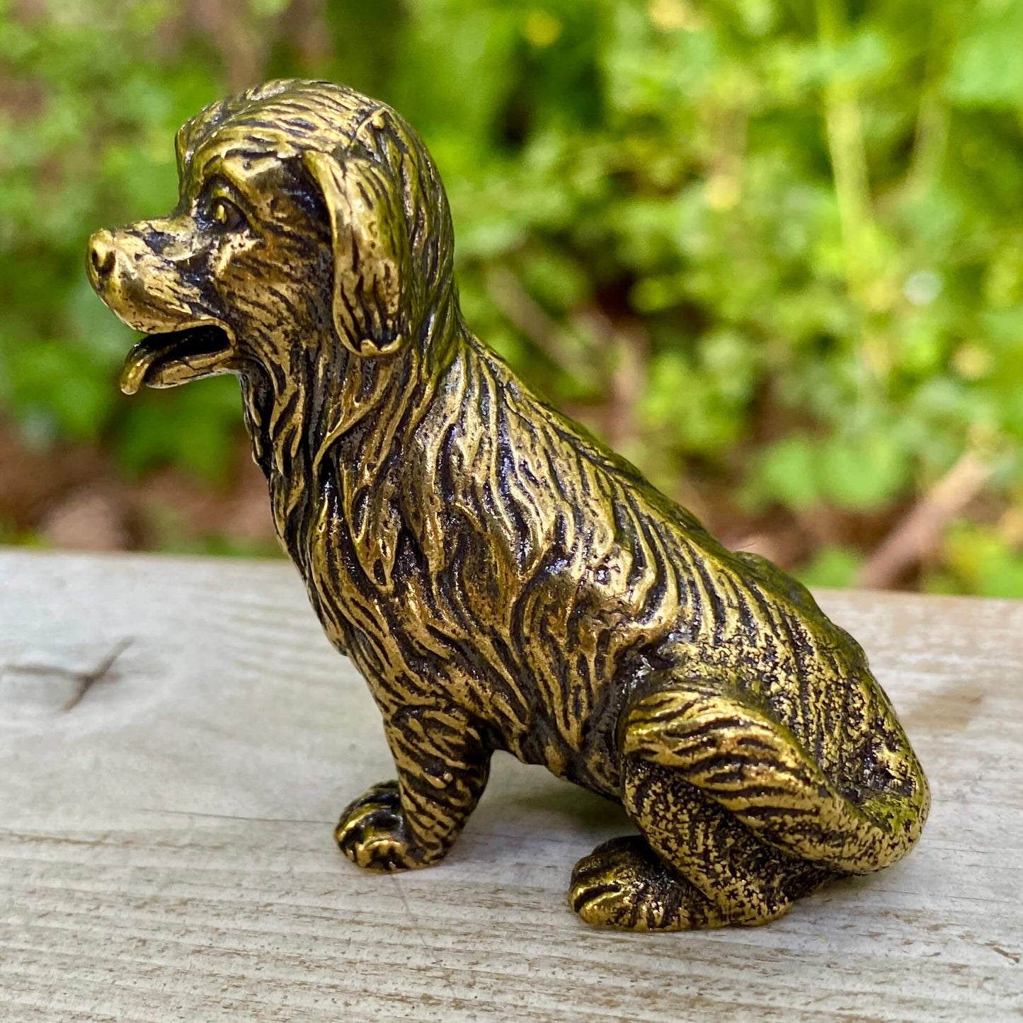 Solid brass golden retriever figurine by Wild Brass, symbol of friendship, loyalty, and joy, with a shiny golden finish.