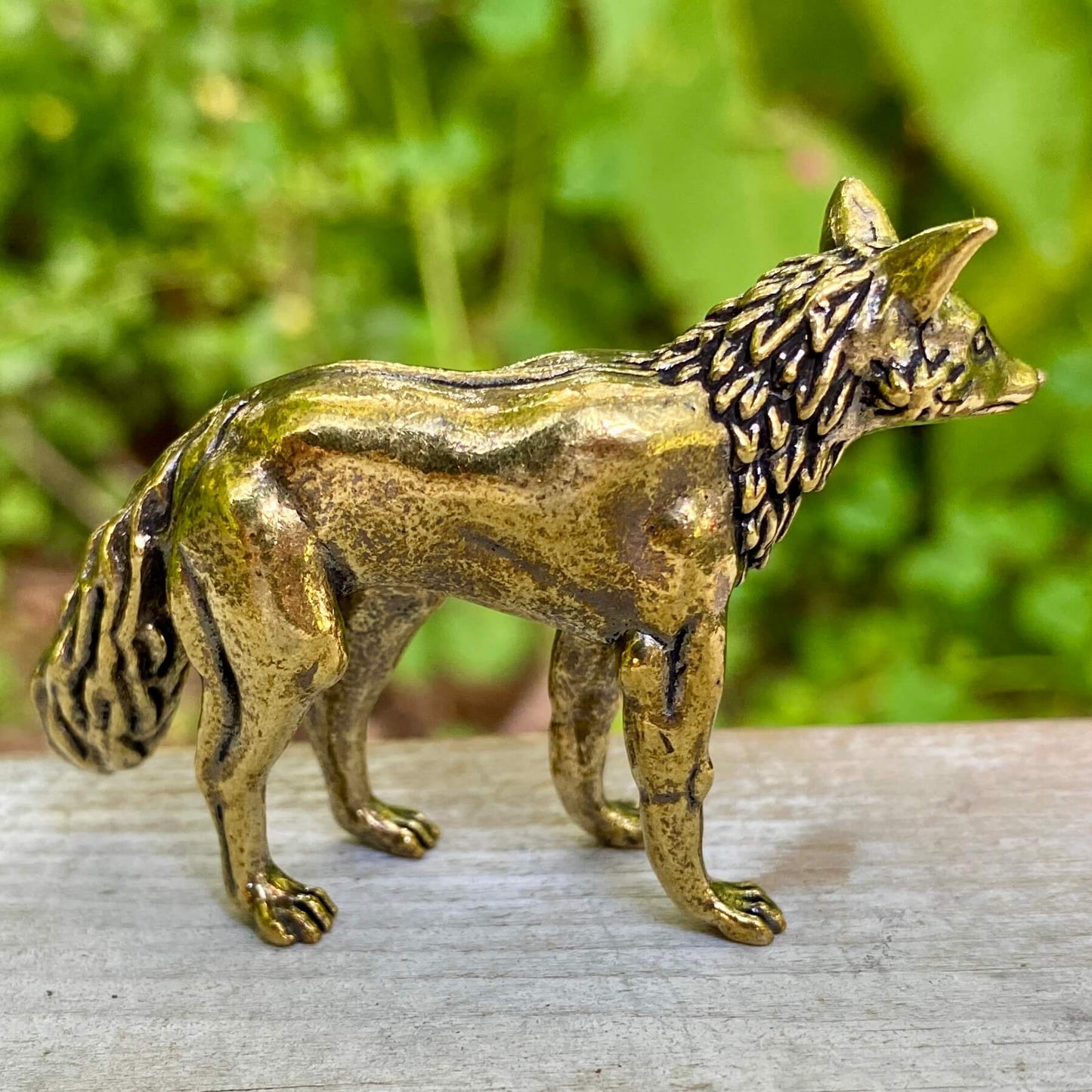 Solid brass fox figurine by Wild Brass, symbol of cleverness and adaptability, showcasing detailed craftsmanship and a sleek design.