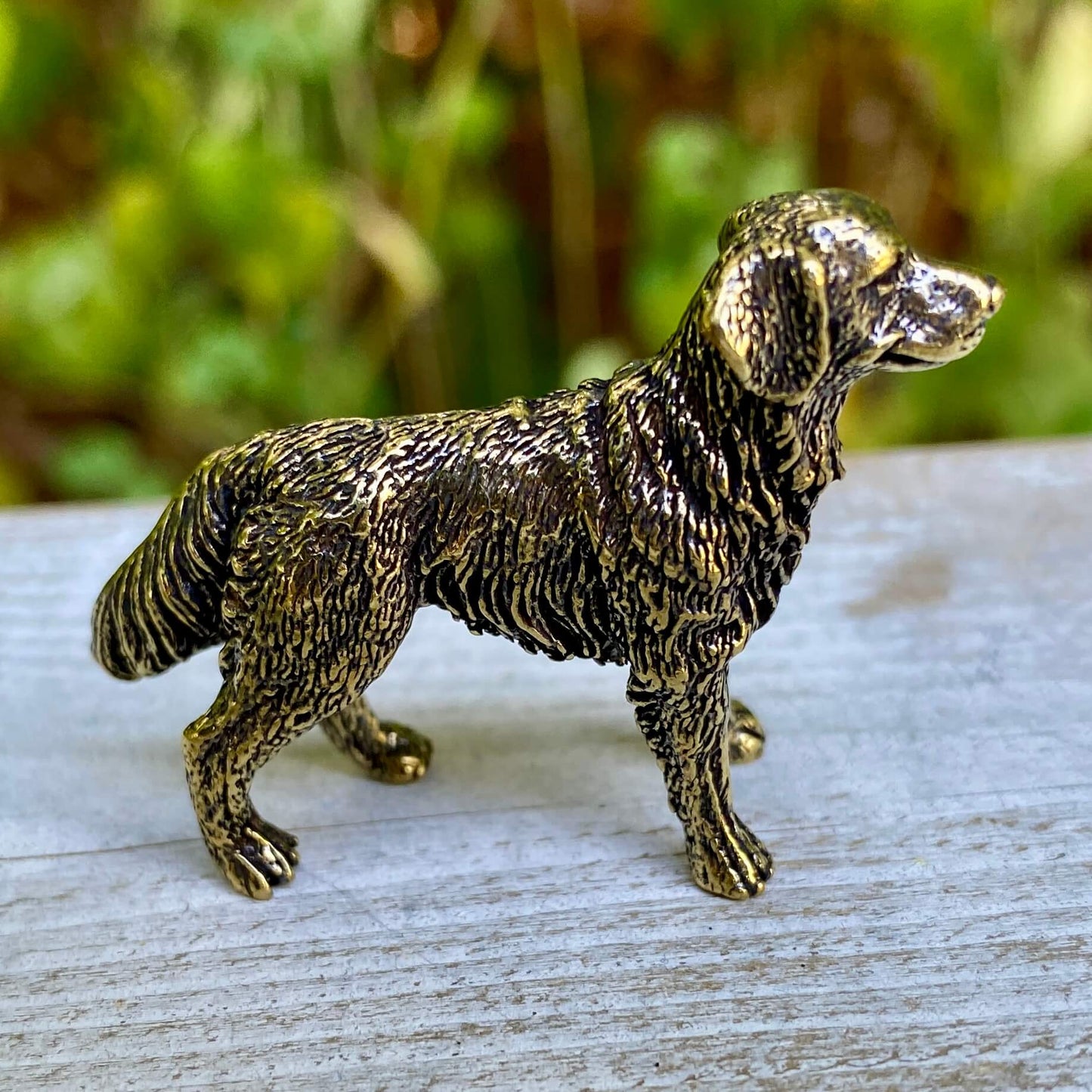 Solid brass Labrador Retriever figurine by Wild Brass, symbolizing loyalty, friendliness, and service, with detailed craftsmanship.