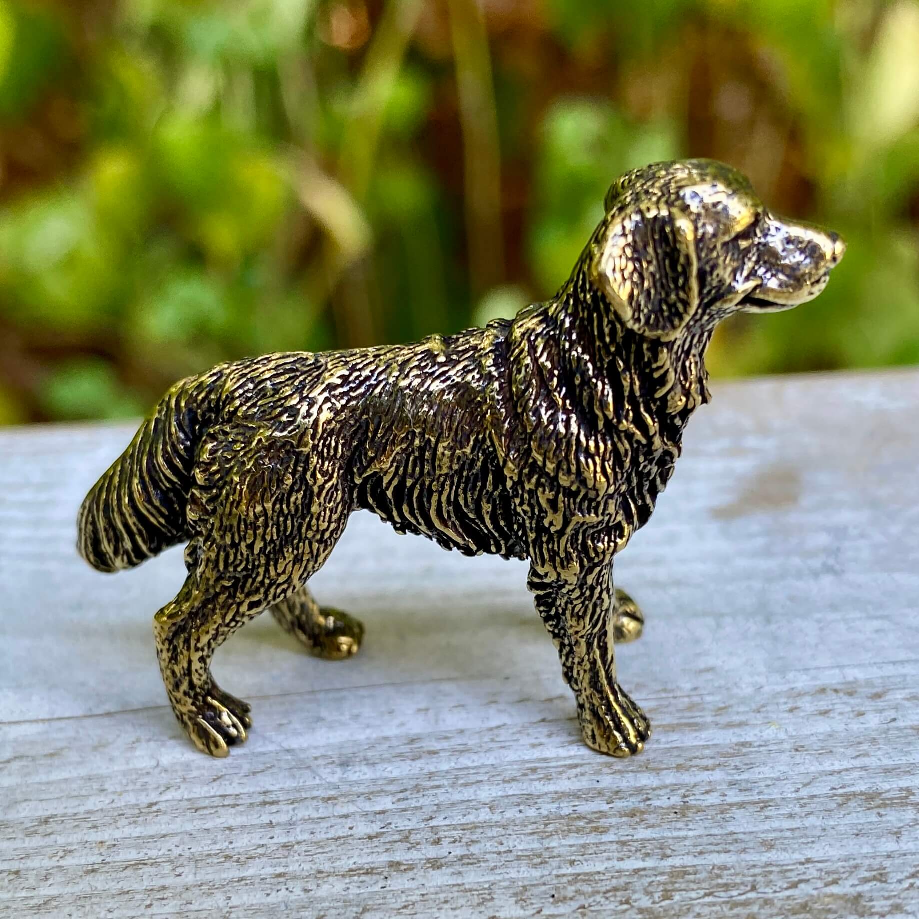 Solid brass Labrador Retriever figurine by Wild Brass, symbolizing loyalty, friendliness, and service, with detailed craftsmanship.
