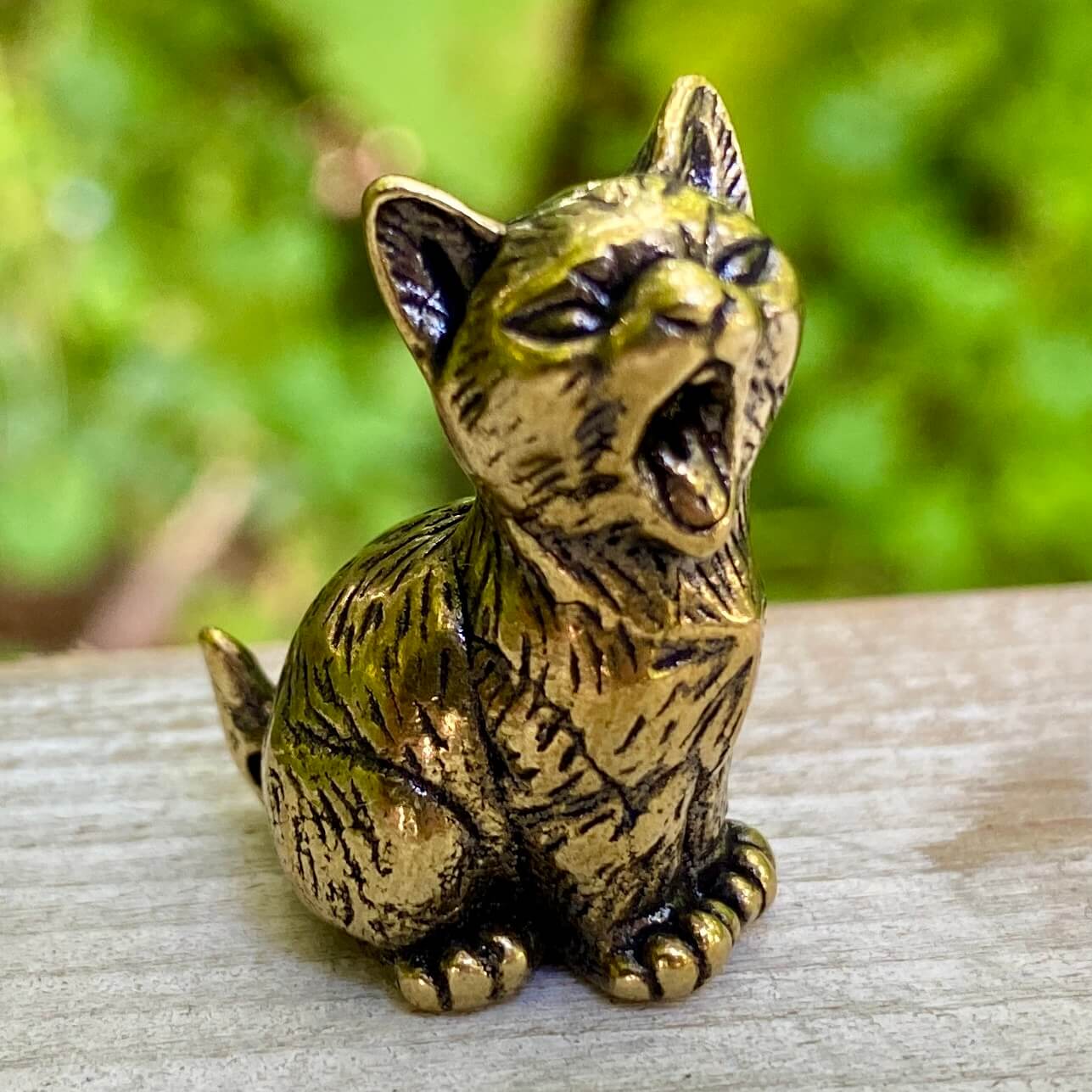 Solid brass cat figurine by Wild Brass, symbolizing independence, mystery, and intuition with detailed craftsmanship.