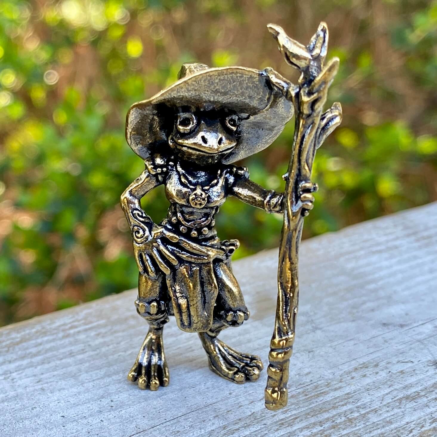 Solid brass wizard lizard figurine by Wild Brass, symbolizing magic, wisdom, and knowledge, with intricate detailing.