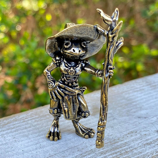 Solid brass wizard lizard figurine by Wild Brass, symbolizing magic, wisdom, and knowledge, with intricate detailing.
