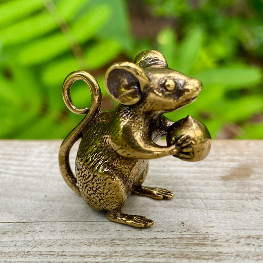 Solid brass mouse sculpture by Wild Brass, symbol of curiosity, adaptability, and awareness, with detailed metallic finish.