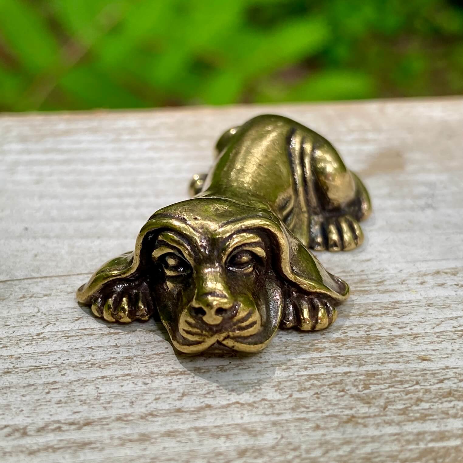 Solid brass Basset Hound figurine by Wild Brass, depicting a loyal, persistent, and calm dog with detailed craftsmanship.