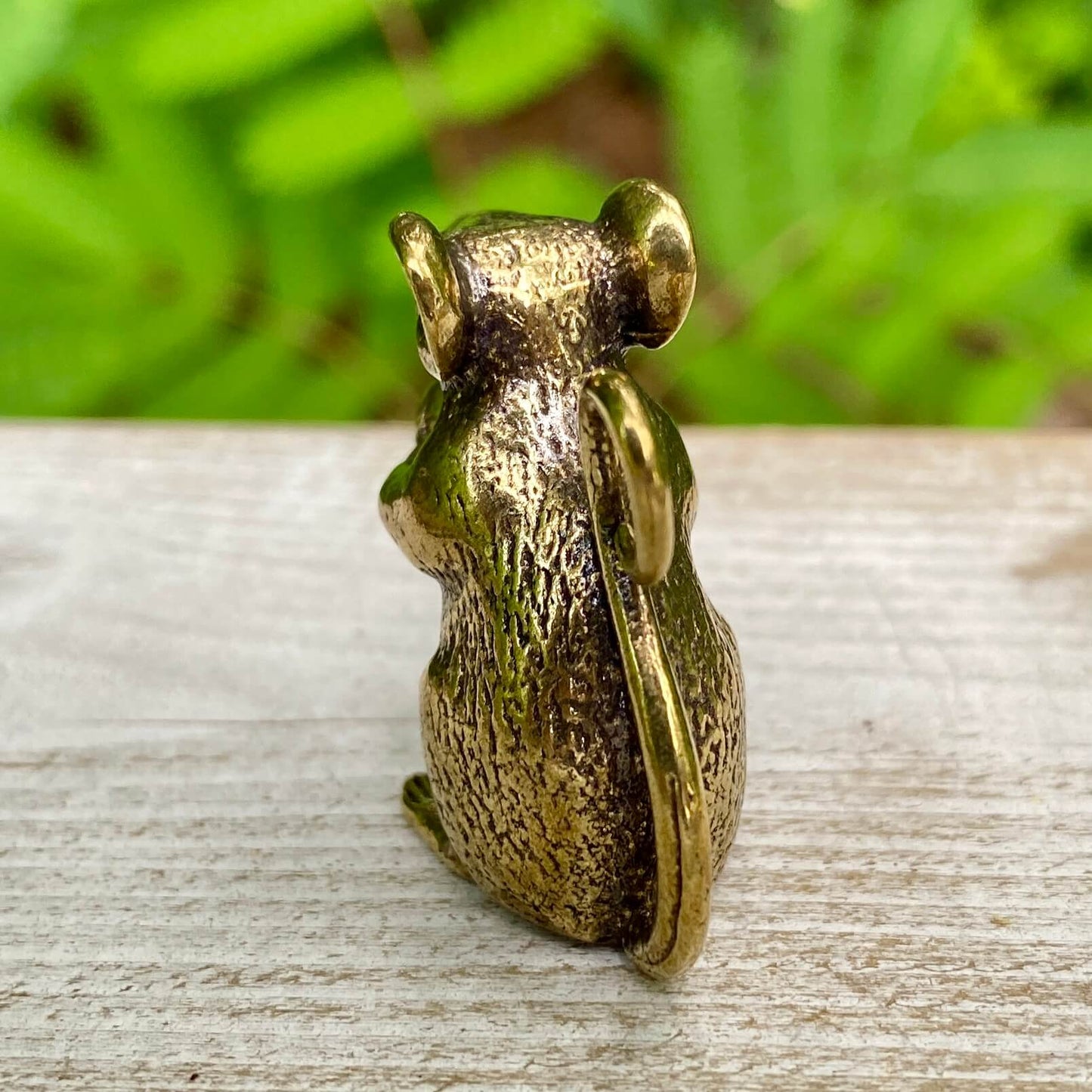 Solid brass mouse sculpture by Wild Brass, symbolizing curiosity, adaptability, and awareness, with a detailed, polished finish.