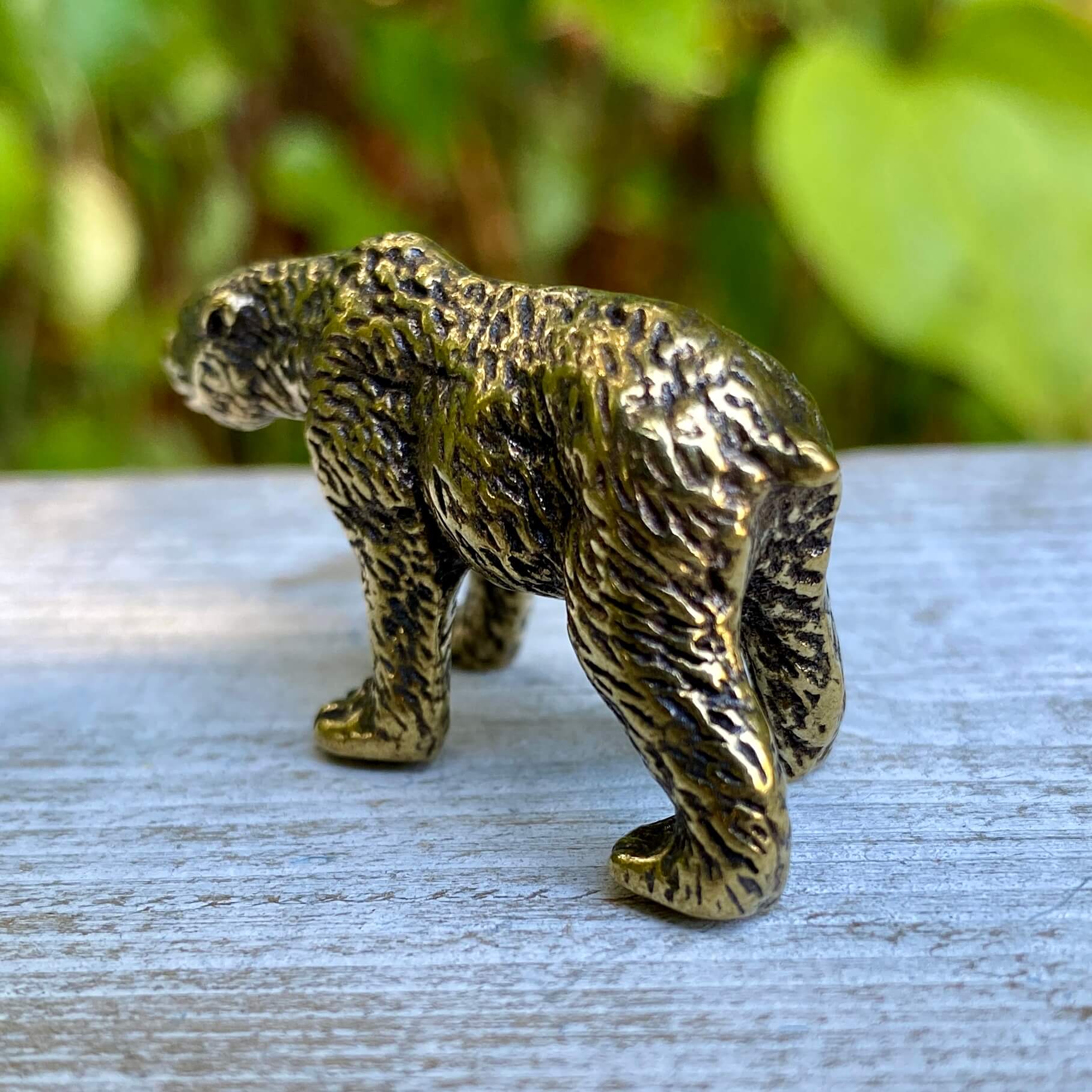 Solid brass bear figurine from Wild Brass, symbolizing strength, protection, and inner power, with detailed bear design.