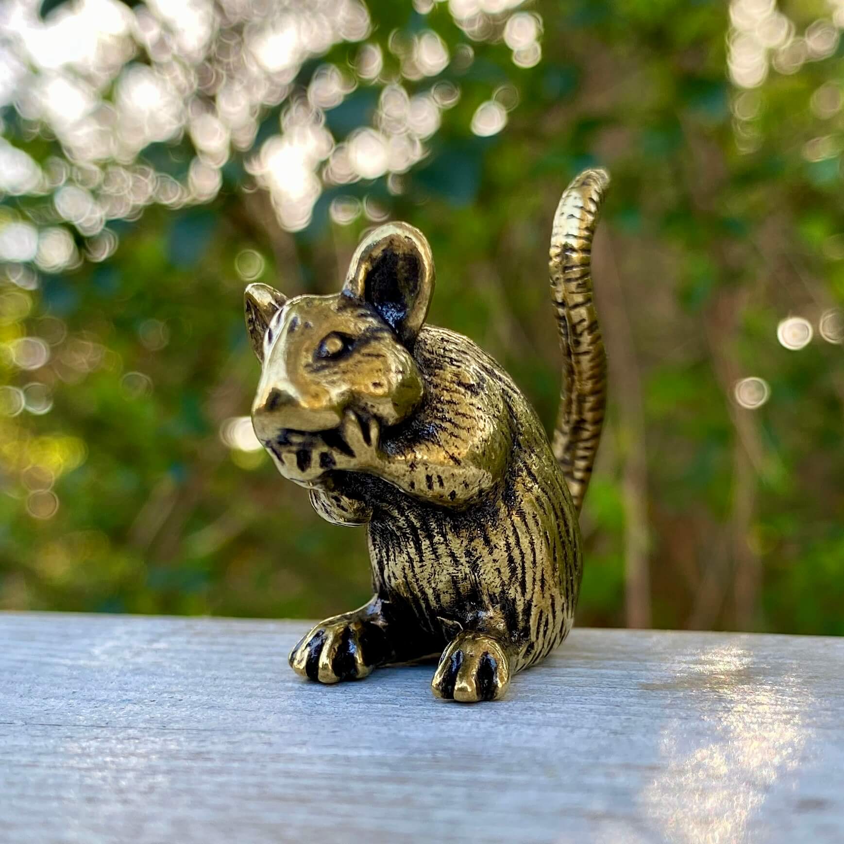 Solid brass rat sculpture by Wild Brass, symbol of intelligence, resourcefulness, and survival, showcasing detailed craftsmanship.