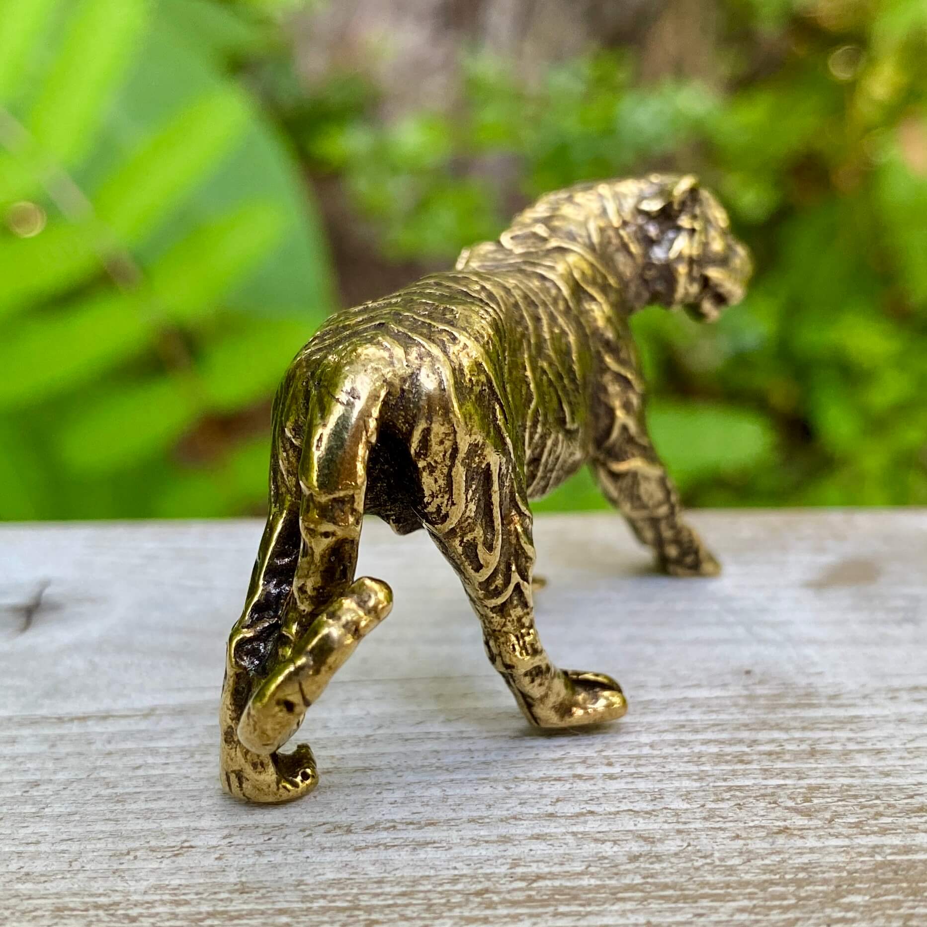 Solid brass tiger sculpture by Wild Brass, symbolizing power, passion, and independence, detailed and polished finish.