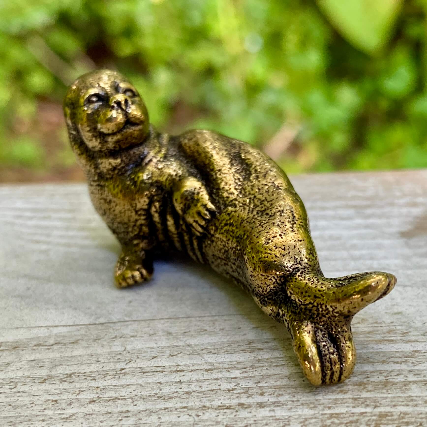Solid brass walrus sculpture by Wild Brass, symbol of wisdom, strength, and community, featuring detailed craftsmanship and a polished finish.