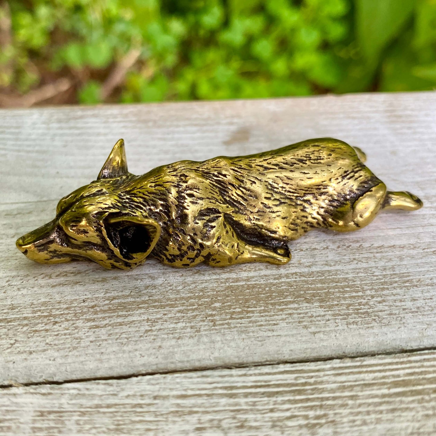 Solid brass Corgi dog figurine by Wild Brass, symbol of joy, loyalty, and playful spirit, shown in a detailed close-up image.