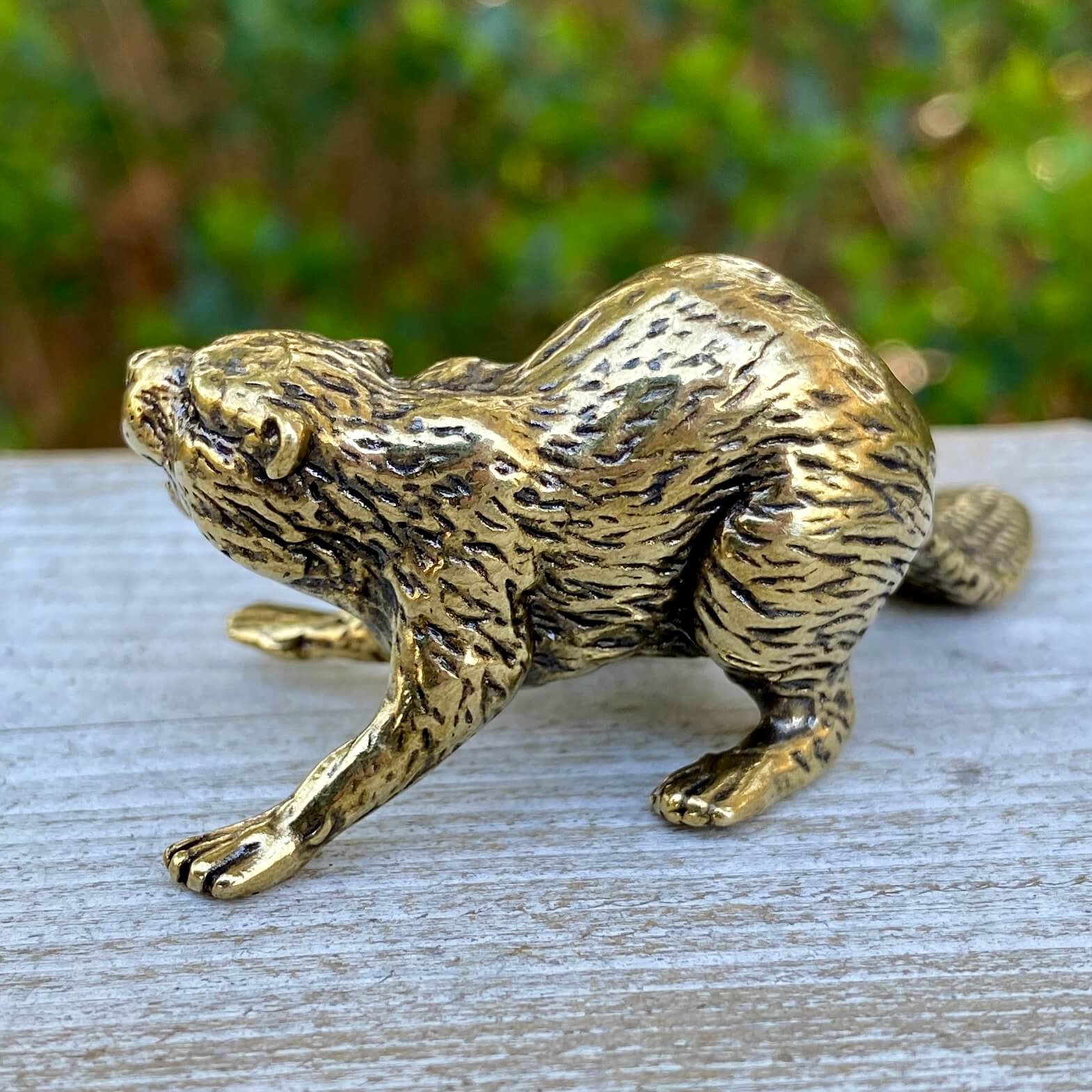 Solid brass beaver figurine from Wild Brass, symbolizing creativity, power, and determination, with detailed craftsmanship.