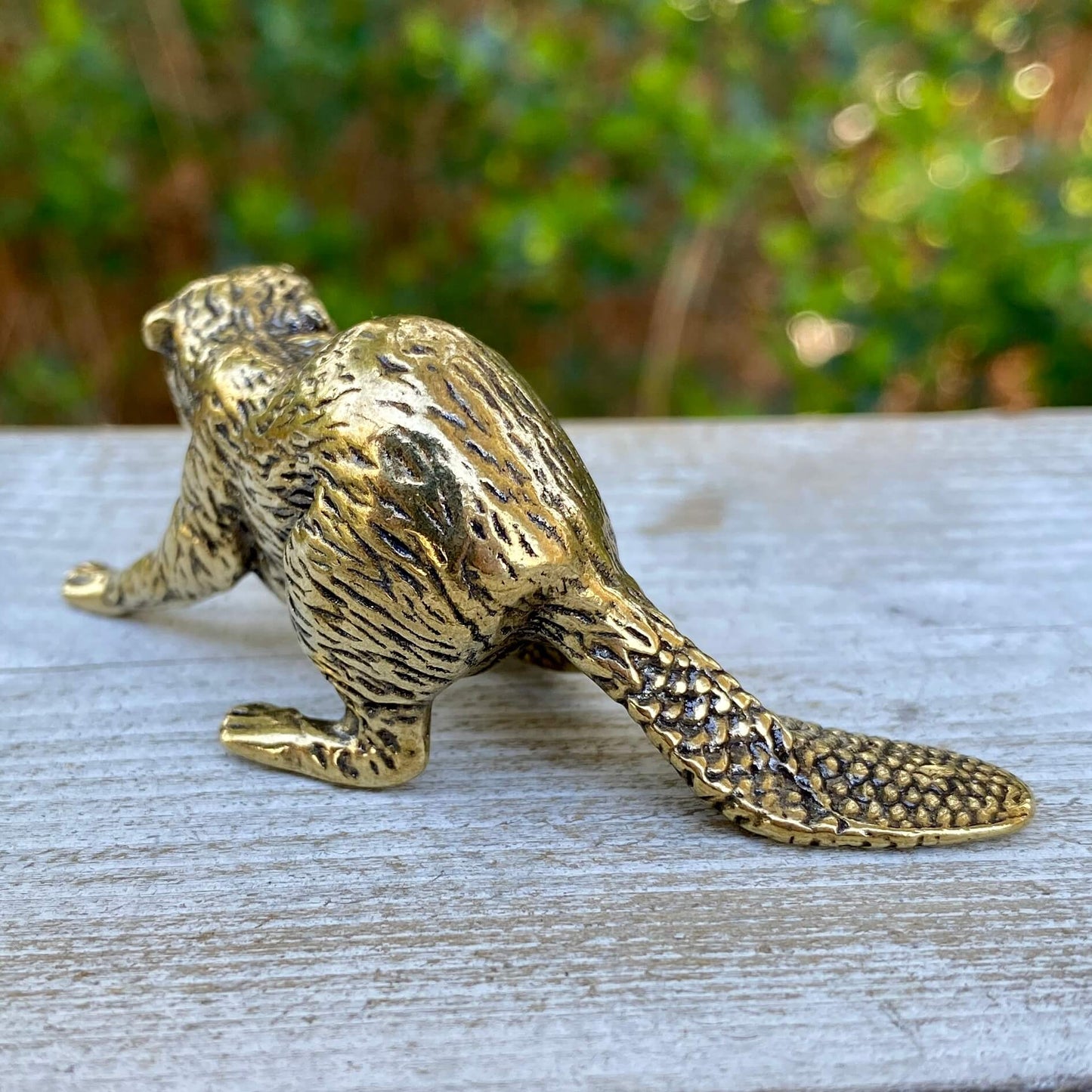 Solid brass beaver sculpture by Wild Brass, symbolizing creativity, power, and determination, with detailed natural finish.