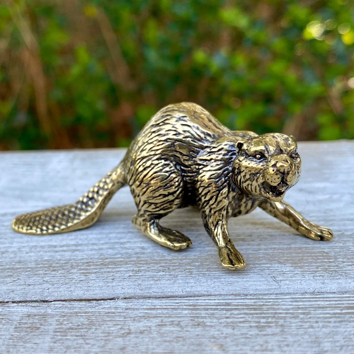 Solid brass beaver sculpture by Wild Brass, symbol of creativity, power, and determination, detailed and polished finish.
