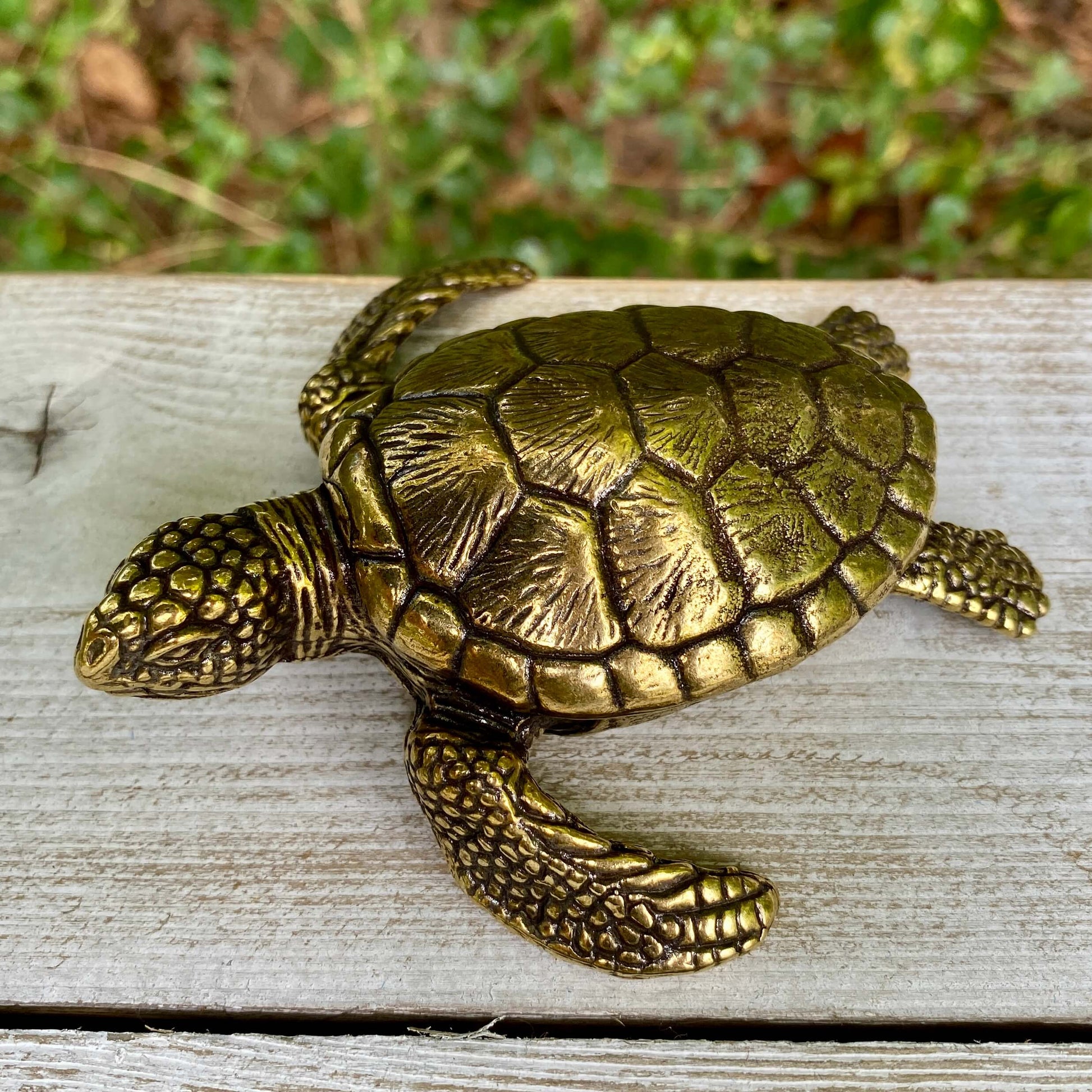 Solid brass sea turtle sculpture by Wild Brass, symbolizing longevity, wisdom, and endurance, with detailed marine turtle design.