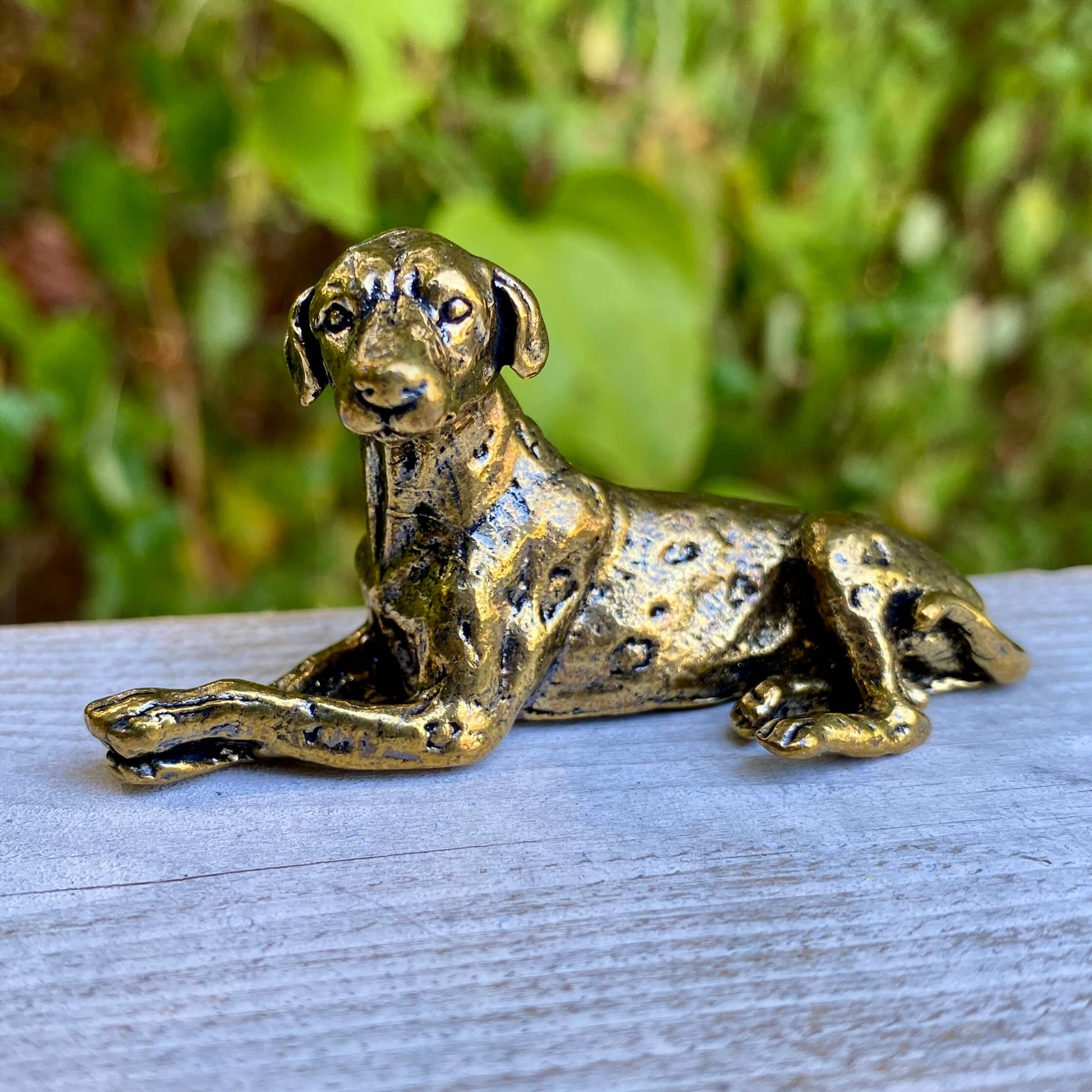 Solid brass Dalmatian dog figurine by Wild Brass, showcasing detailed spots and a loyal, protective stance.