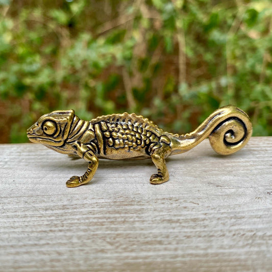 Solid brass chameleon figurine by Wild Brass, symbolizing adaptability, change, and perception with detailed craftsmanship.