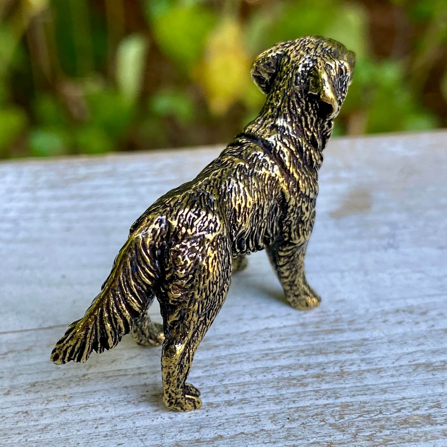 Solid brass Labrador Retriever figurine by Wild Brass, depicting a friendly dog symbolizing loyalty and service.