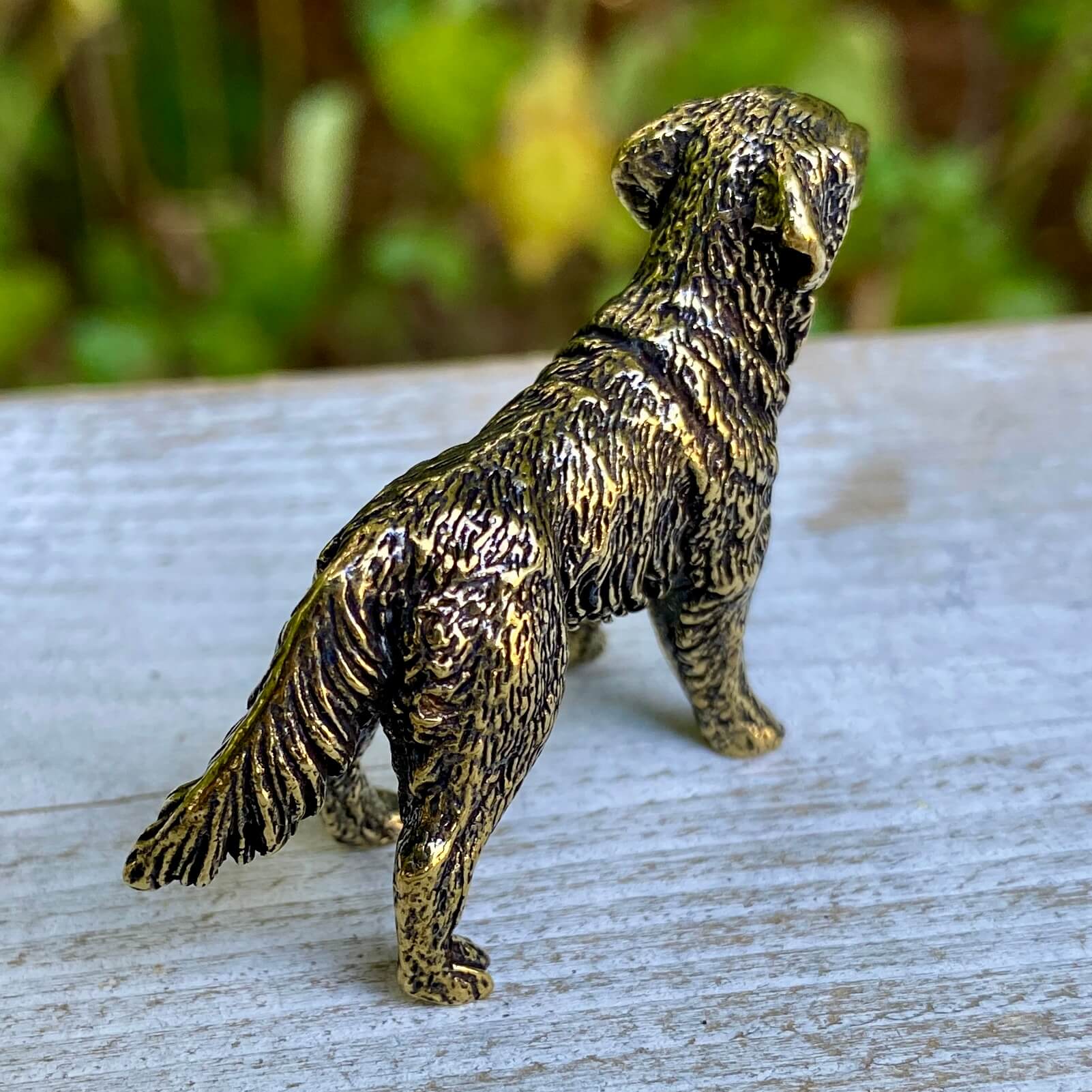Solid brass Labrador Retriever figurine by Wild Brass, depicting a friendly dog symbolizing loyalty and service.