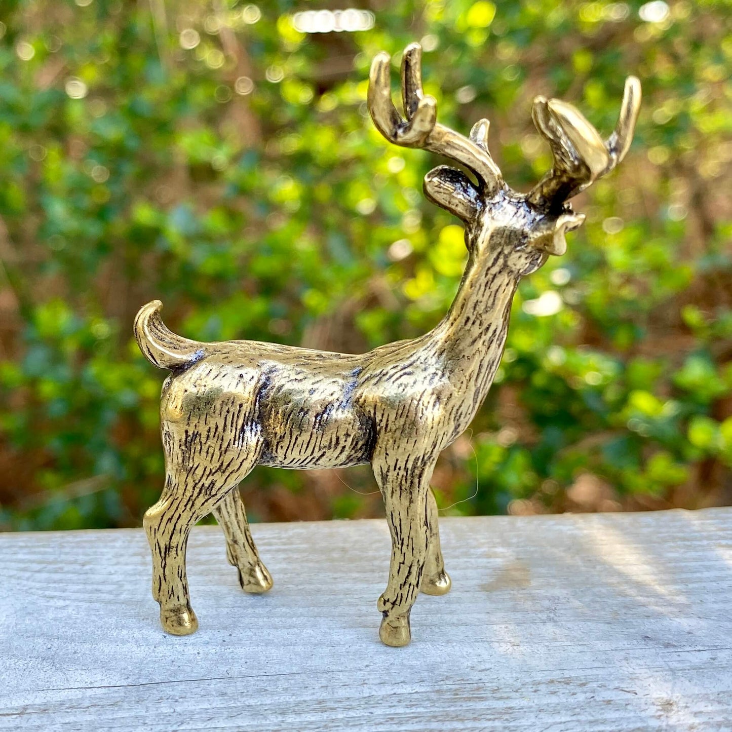 Solid brass stag deer sculpture by Wild Brass, symbol of strength, courage, and wisdom, detailed and polished finish.