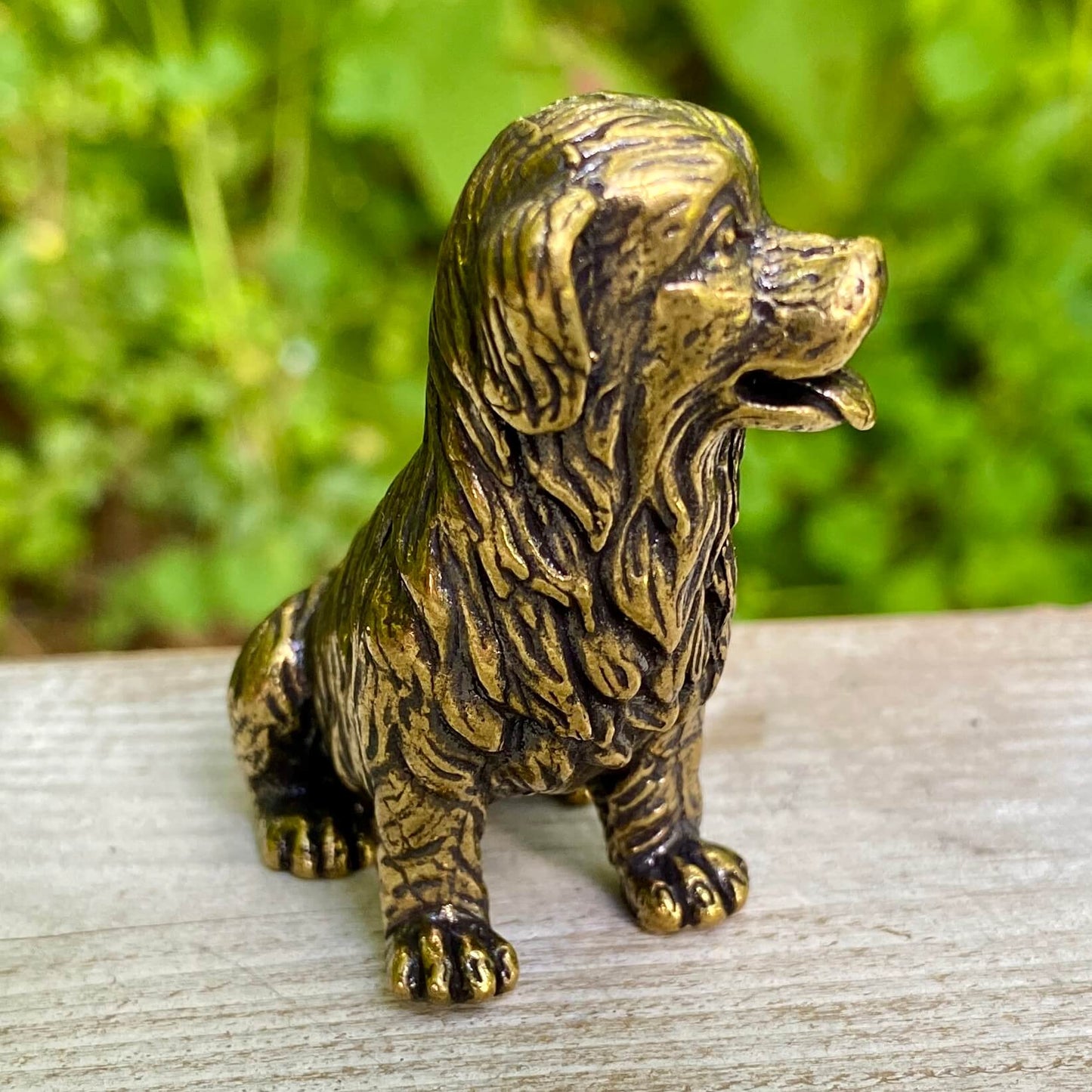 Solid brass Golden Retriever figurine by Wild Brass, symbol of friendship, loyalty, and joy, with a shiny golden finish.