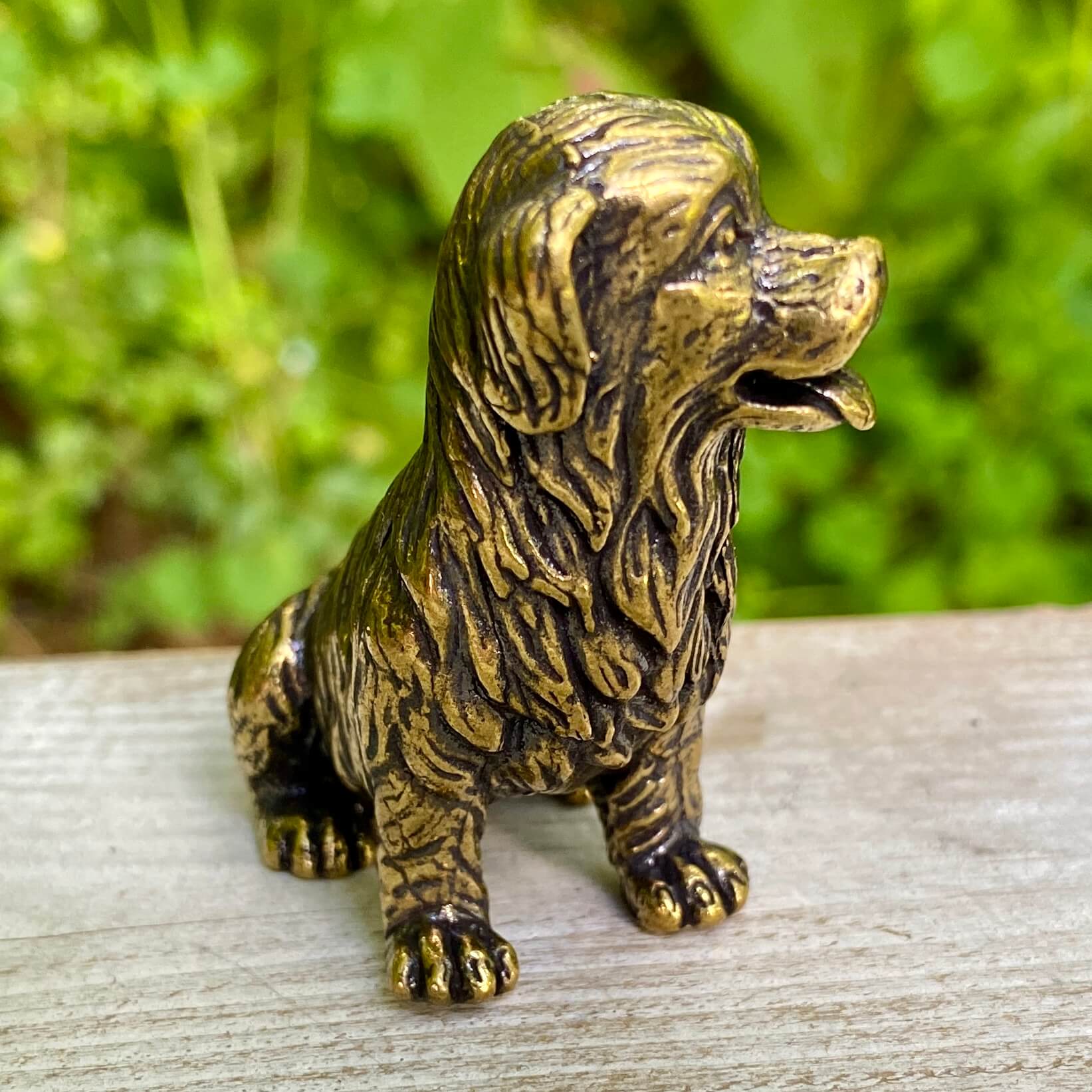 Solid brass Golden Retriever figurine by Wild Brass, symbol of friendship, loyalty, and joy, with a shiny golden finish.