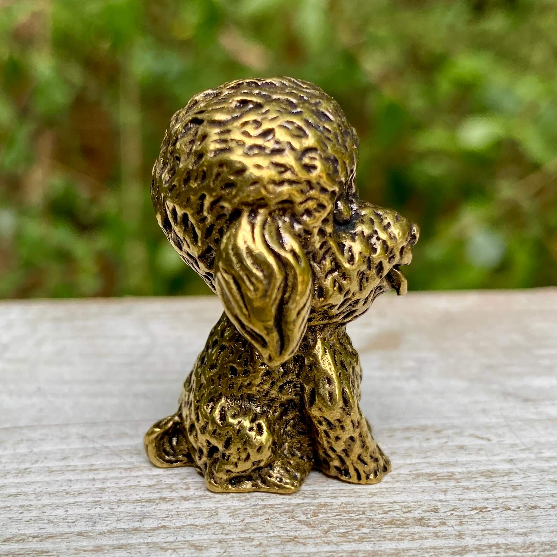 Solid brass poodle sculpture by Wild Brass, showcasing a detailed, elegant dog figure symbolizing intelligence and loyalty.