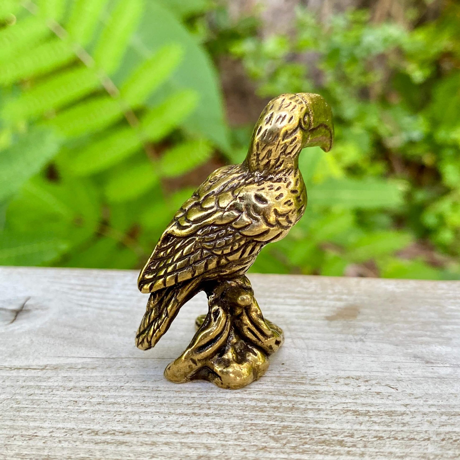 Solid brass toucan bird sculpture by Wild Brass, showcasing vibrant colors and playful design, symbolizing communication and vibrancy.