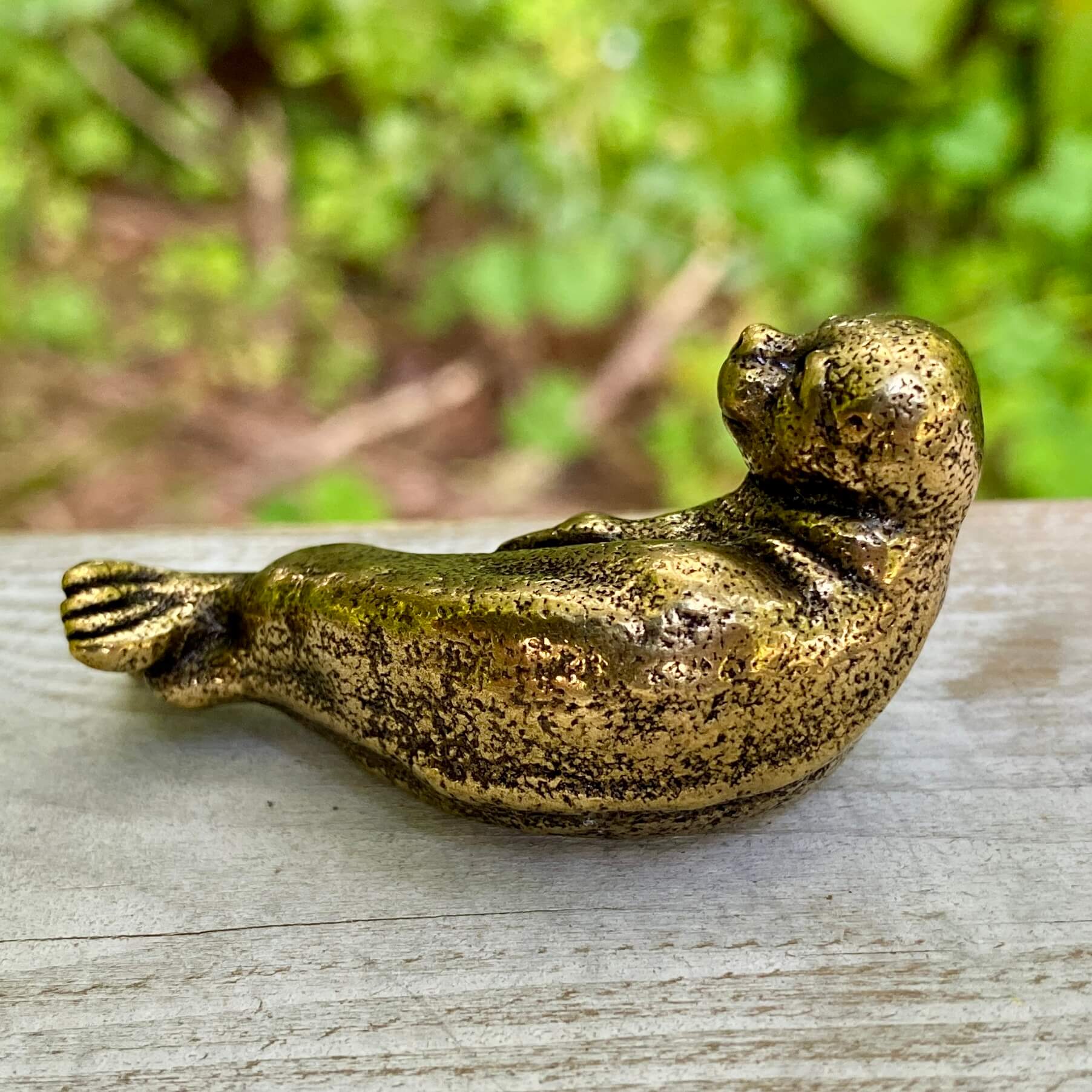 Solid brass walrus sculpture by Wild Brass, symbolizing wisdom, strength, and community, with detailed craftsmanship.