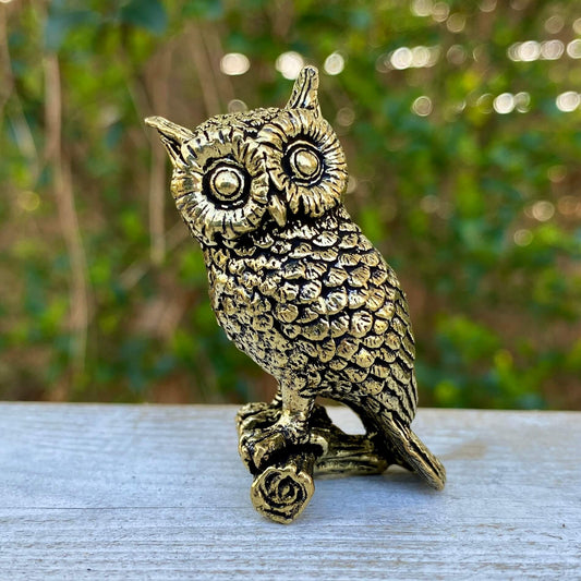 Solid brass owl sculpture by Wild Brass, symbol of wisdom and intuition, detailed craftsmanship and a polished finish.