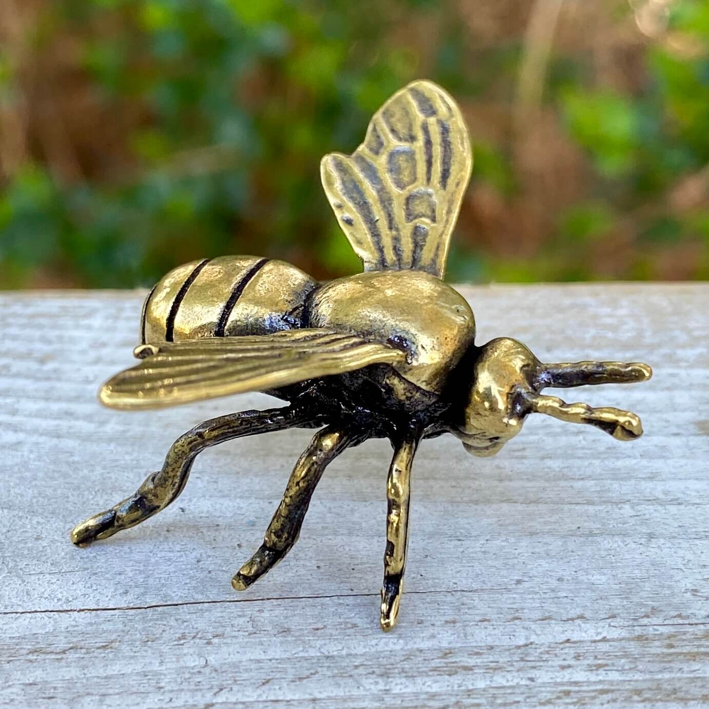 Solid brass bee sculpture by Wild Brass, symbol of harmony, beauty, and purpose, featuring detailed bee design.